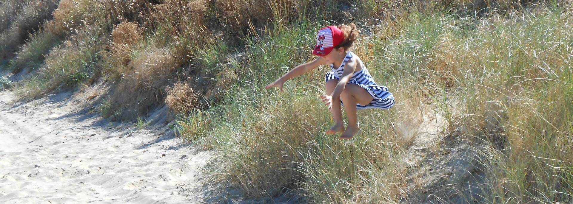 Playing in the dunes at Boyardville