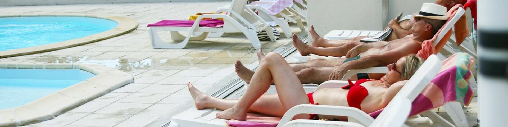 Relaxing by the pool